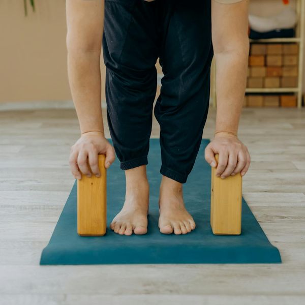 Person doing a balancing exercise in a calm environment.